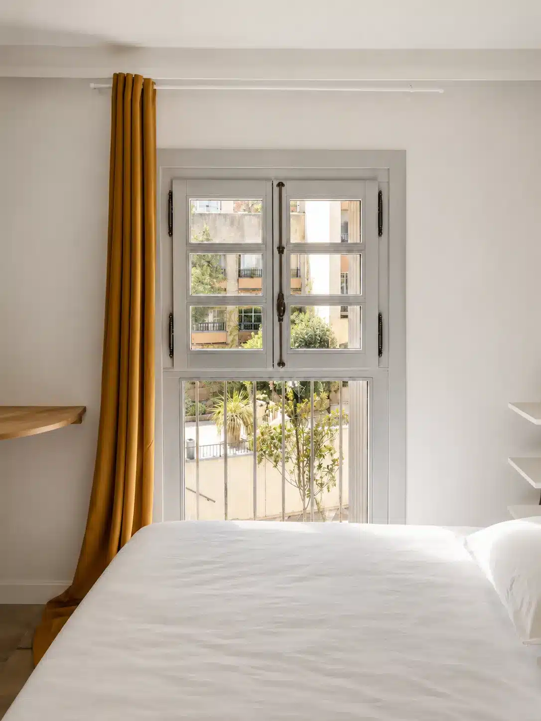 Wooden windows and French doors for a townhouse in a protected historic city center KDM